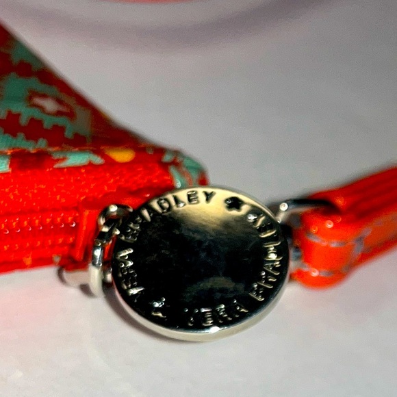 Vera Bradley bowtie crossbody. Orange,teal vinyl. Zips each end. 8.5x5” EUC  tag - Picture 3 of 9